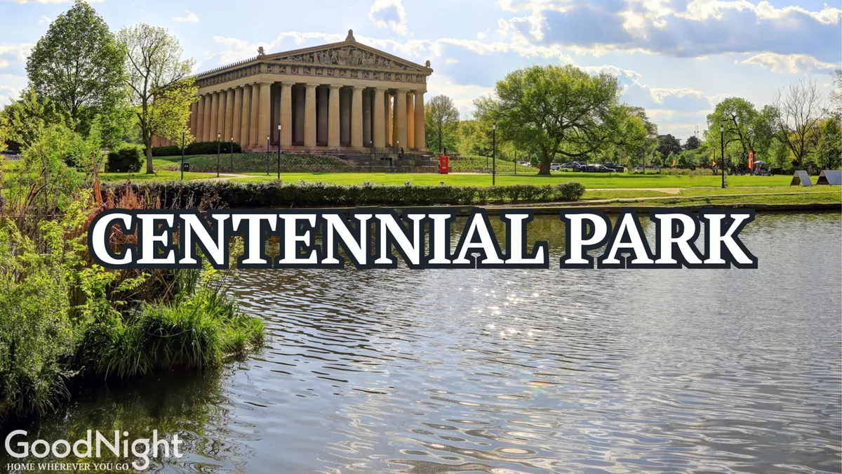 A serene view of the Parthenon-like structure reflected on a calm lake, surrounded by lush greenery. People are seen strolling and enjoying the outdoor environment, echoing the area’s blend of culture and leisure.